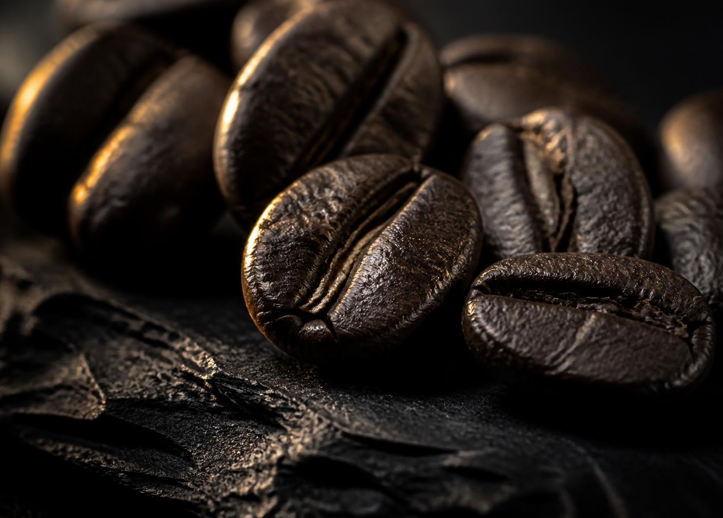 Macro shot of dark roasted coffee beans